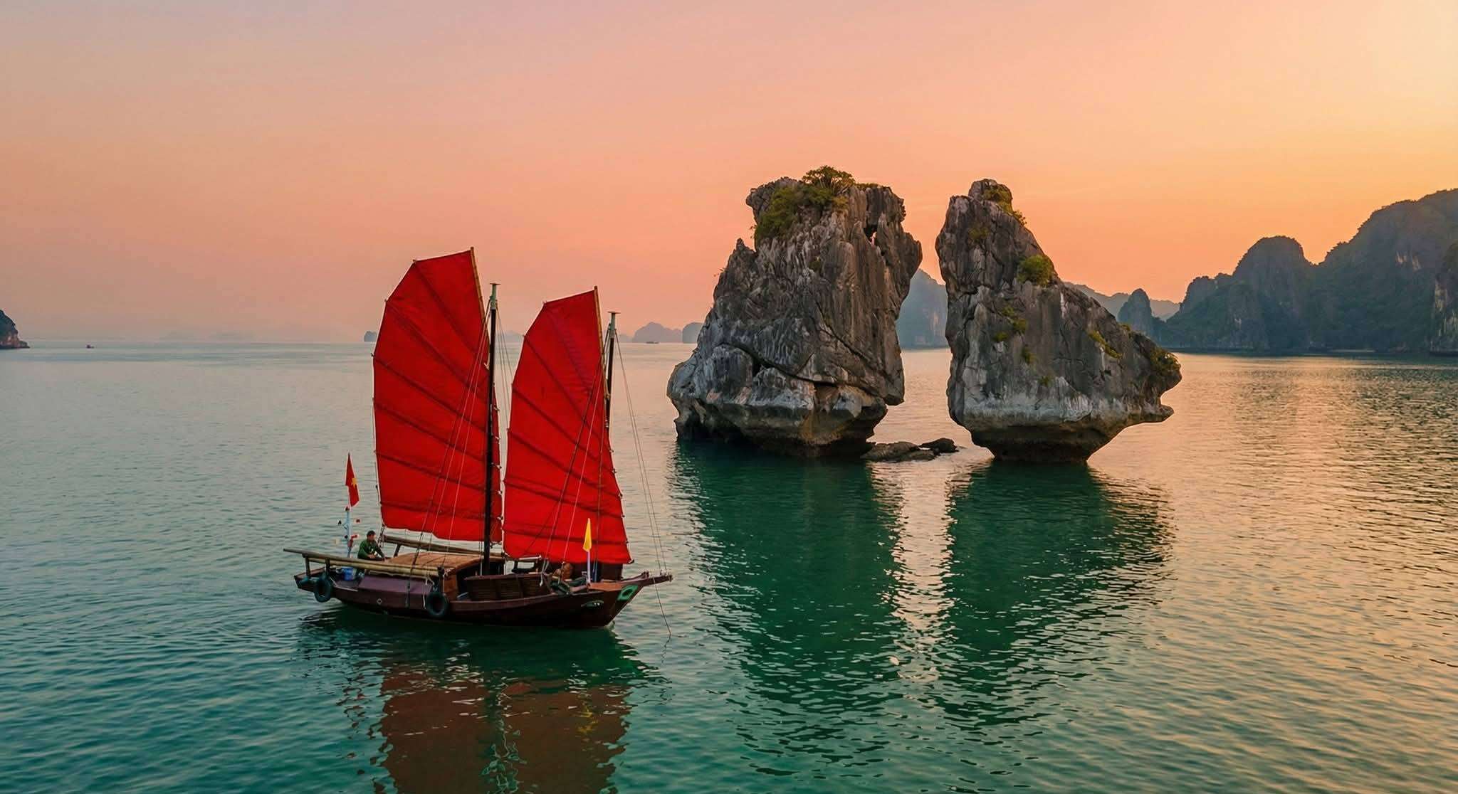 red-sailboats-ha-long-bay Traditional Red sailboat in Ha Long Bay